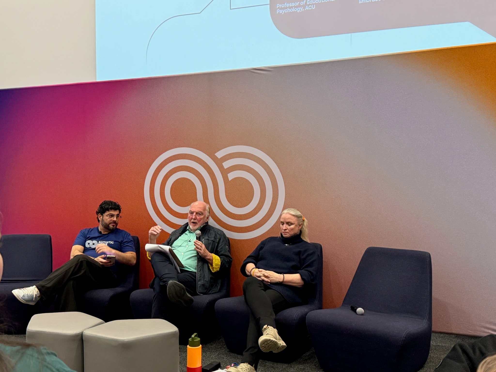 Three panellists in conversation at Autistic Pride Day 2025